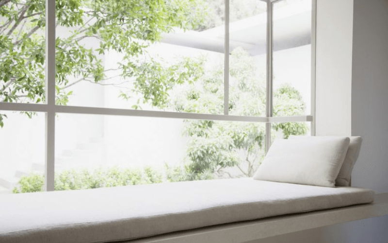 sitting bench by large window