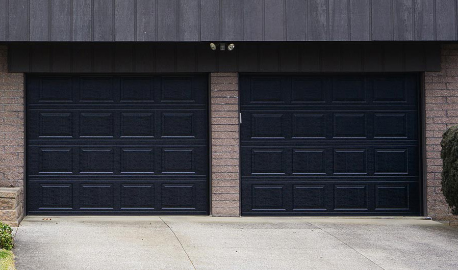 Classic steel garage doors in black.