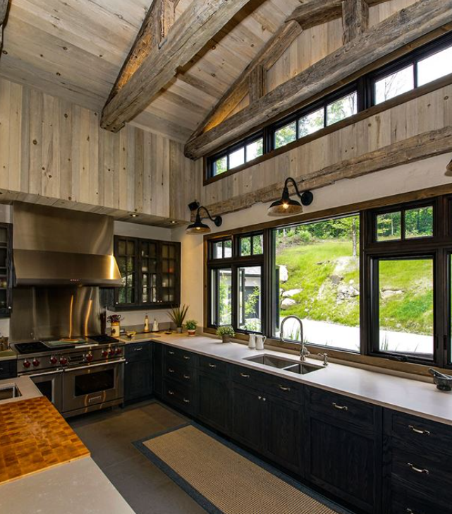 Image of a kitchen with new black modern windows.